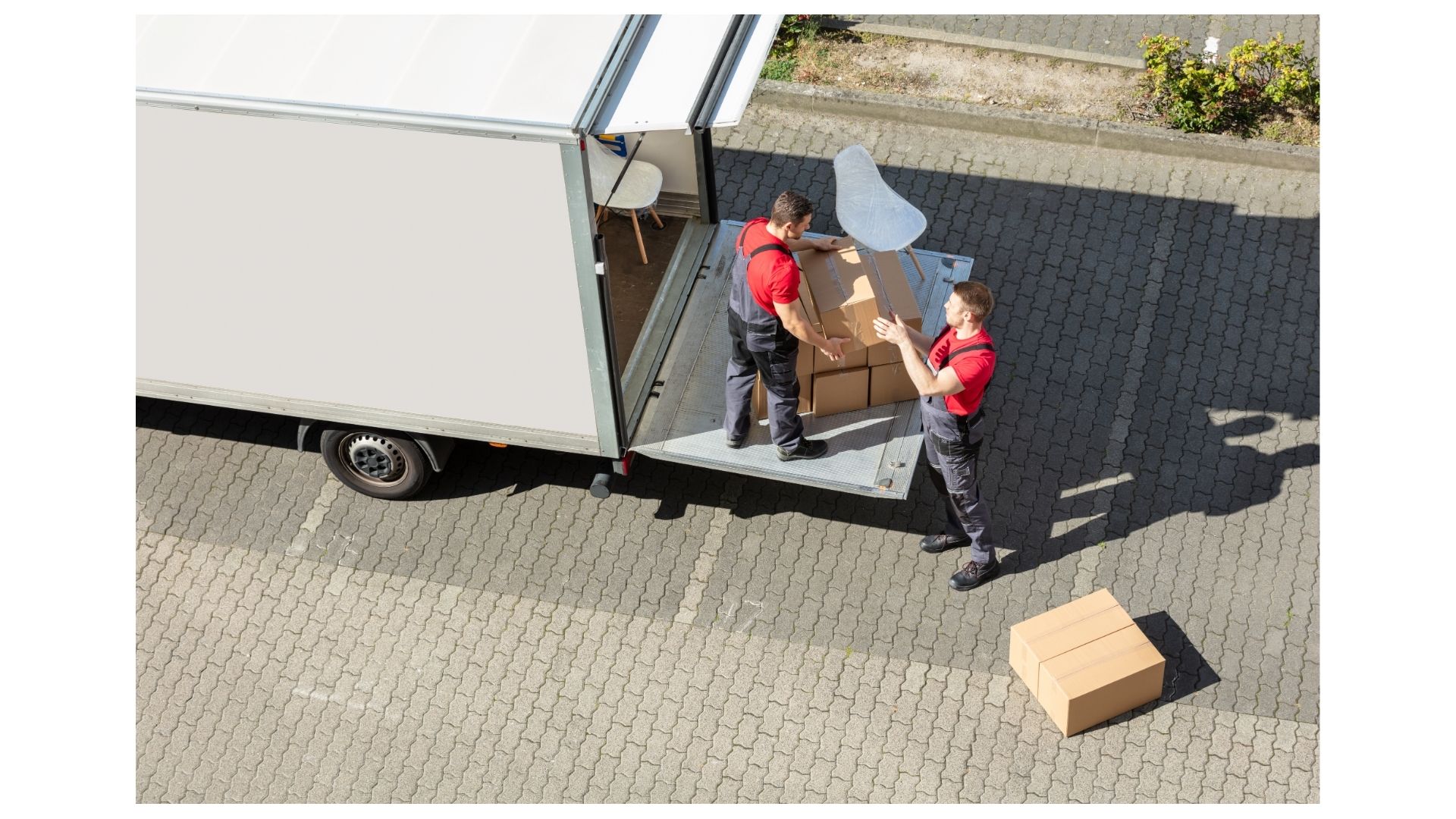 Long distance movers Bryan College Station TX — D&D Moving crew loading truck for interstate move