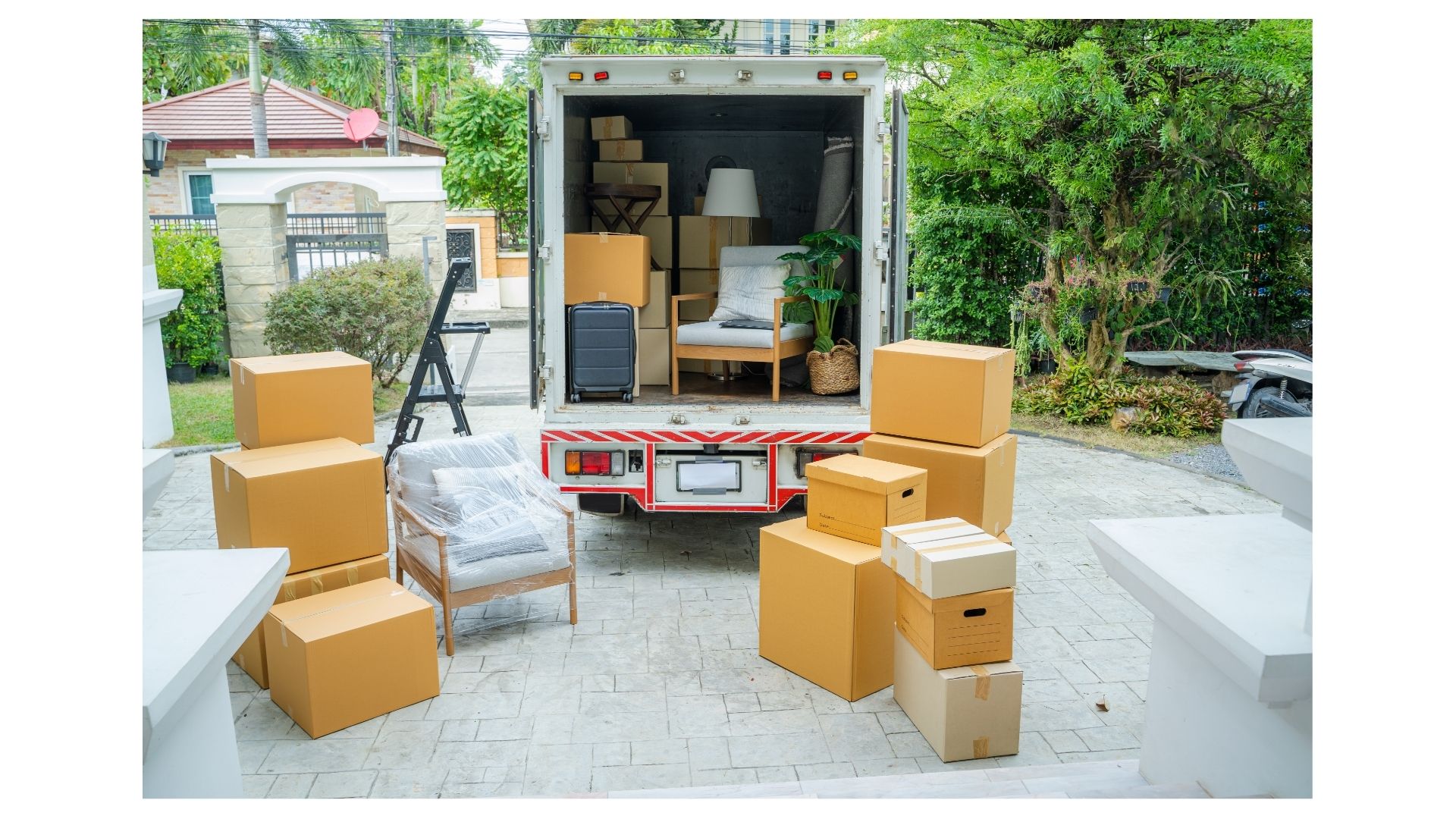 Packing services Bryan College Station TX — D&D Moving truck loaded with carefully packed boxes and furniture
